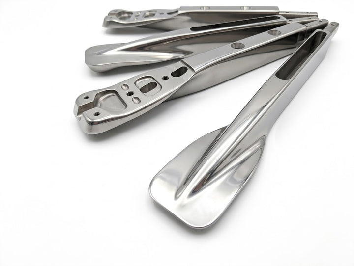 Titanium product picture of four titanium front sections together.
